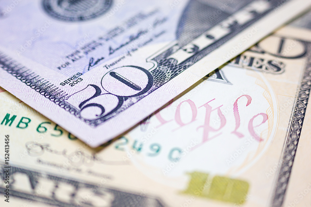 Close-up Dollars, American Dollars Cash Money, Dollar Banknotes, Business and Finance Concepts. Close-up Dollars, American Dollars Cash Money, Dollar Banknotes, Business and Finance Concepts.