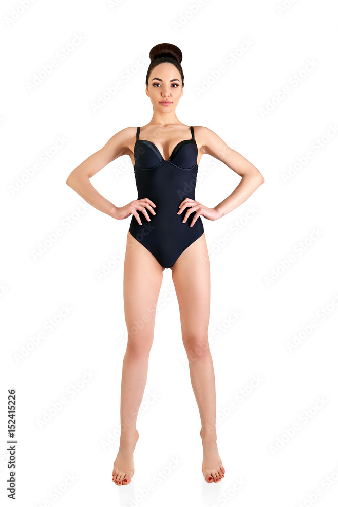 Portrait of beautiful woman, full length. Attractive girl with perfect body posing at studio over white background with copy space. Portrait of beautiful woman, full length. Attractive girl with perfect body posing at studio over white background with copy space.