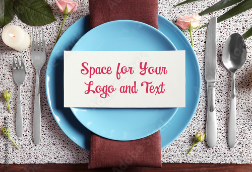 Beautiful festive table setting on wooden table