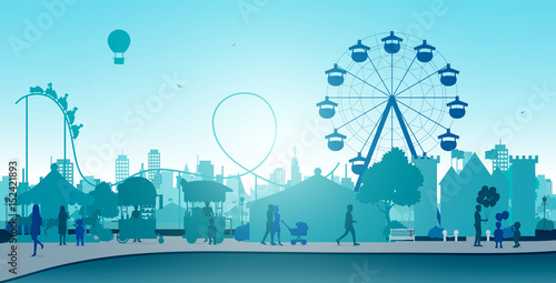 Wheel amusement parks with backdrop buildings