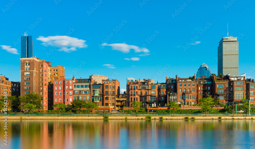 Boston, USA: Old historical houses and skyscrapers buildings reflected in water of Charles River, Boston Back bay district