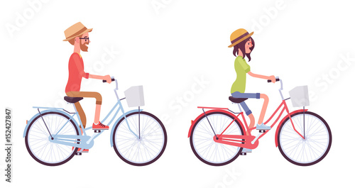 Young man and woman riding a bike
