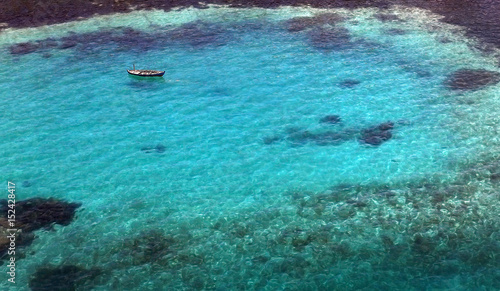 Boat on clea water