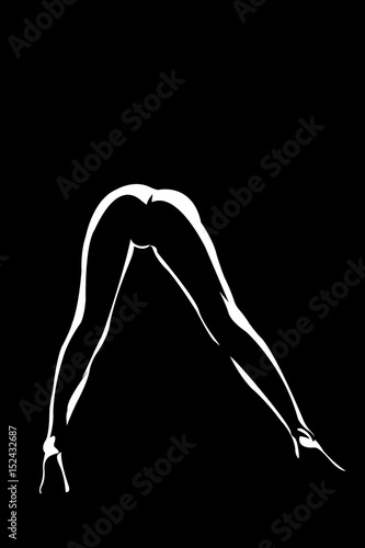 Silhouette of the slender legs of a bent woman. photo