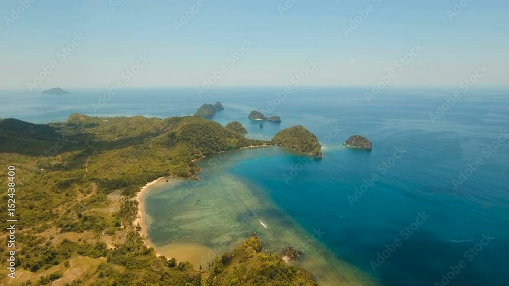 Aerial view of beautiful Seascape with tropical islands with sand beach, azure water. Tropical lagoon with turquoise water. Philippines. 4K video. Travel concept. Aerial video. Aerial footage. Aerial view of beautiful Seascape with tropical islands with sand beach, azure water. Tropical lagoon with turquoise water. Philippines. 4K video. Travel concept. Aerial video. Aerial footage.