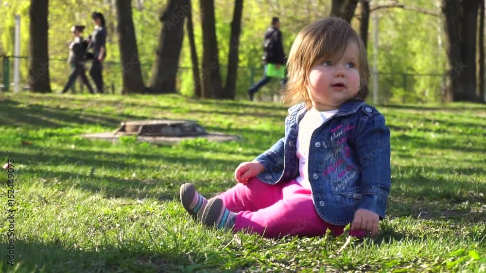 Little baby girl in the park