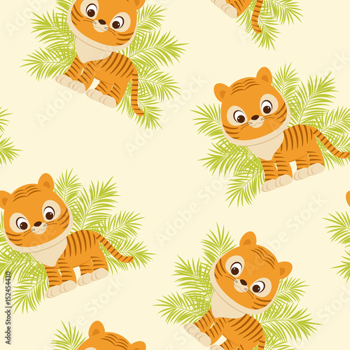 Fototapeta Naklejka Na Ścianę i Meble -  Tiger cub in tropical leaves