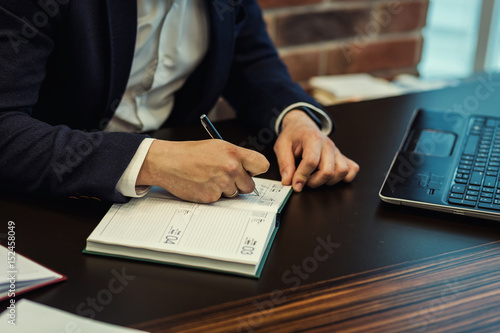 Businessman Working Laptop Connecting Networking Concept,Businessman working with documents on office desk.Business concept.Close up