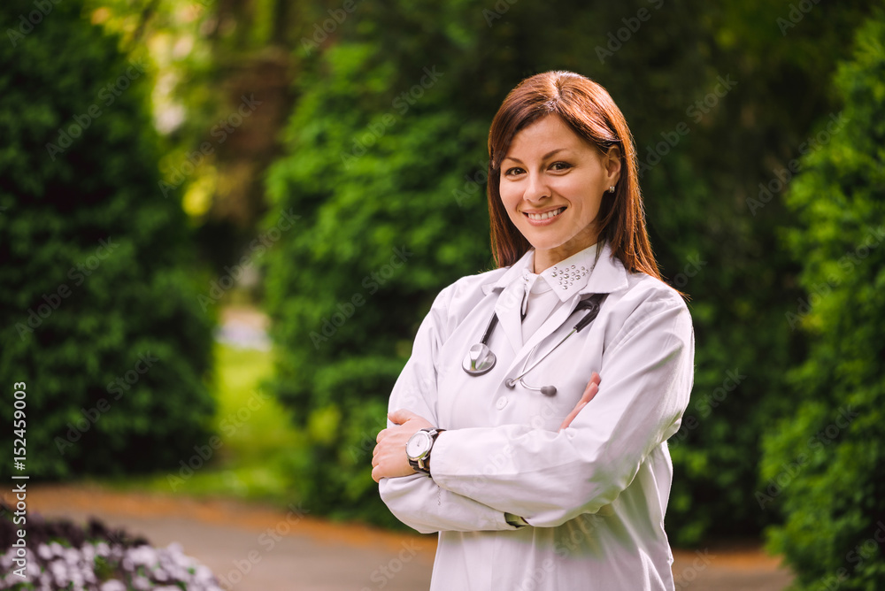 Closeup portrait of beautiful confident female doctor with stethoscope Closeup portrait of beautiful confident female doctor with stethoscope