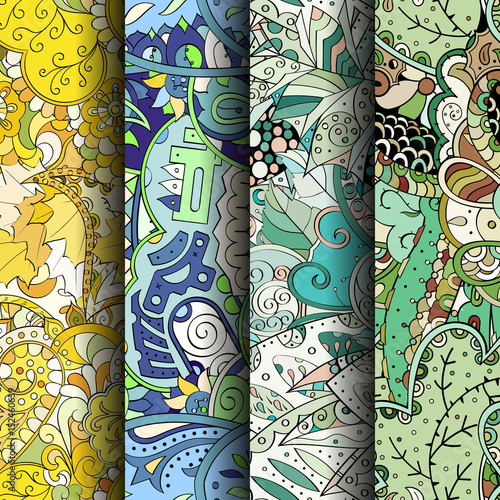 Set of tracery colorful seamless patterns. Vertical stripes. Curved doodling backgrounds for textile or printing with mehndi and ethnic motives. Vector