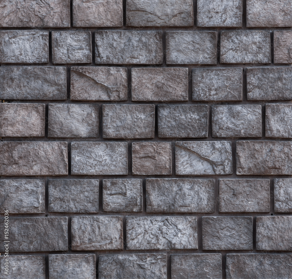 Structure of a wall of solid stone blocks, a fortification wall, a stone castle