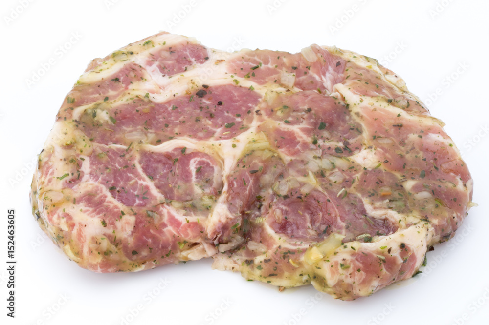 Pork chop, marinated. Isolated on the white background. Pork chop, marinated. Isolated on the white background.