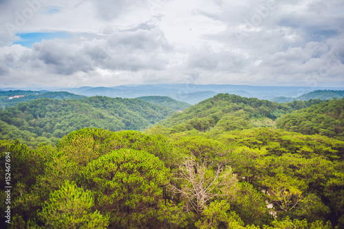 Fantastic landscape of Dalat Mountains, Viet Nam, fresh atmosphere, villa among forest, impression shape of hill and mountain from high view, wonderful vacation for ecotourism in spring photo