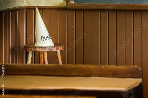 Dunce hat in an old school class.