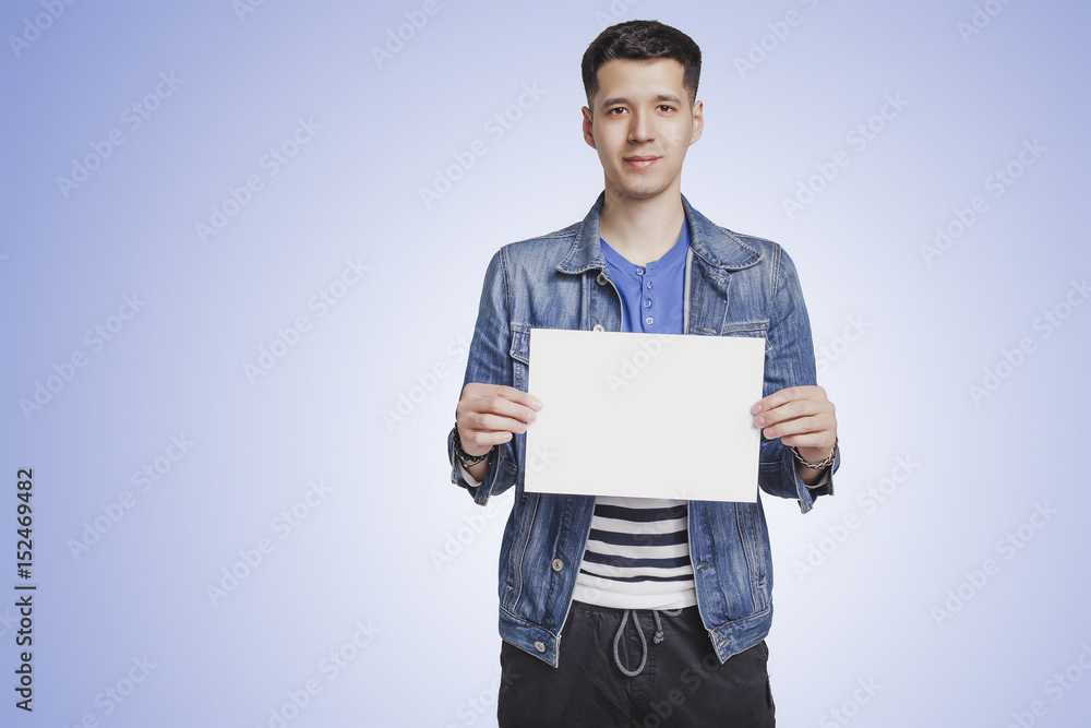 Man holding a piece of paper Man holding a piece of paper