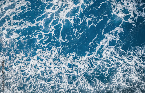 Wave texture, blue sea background.