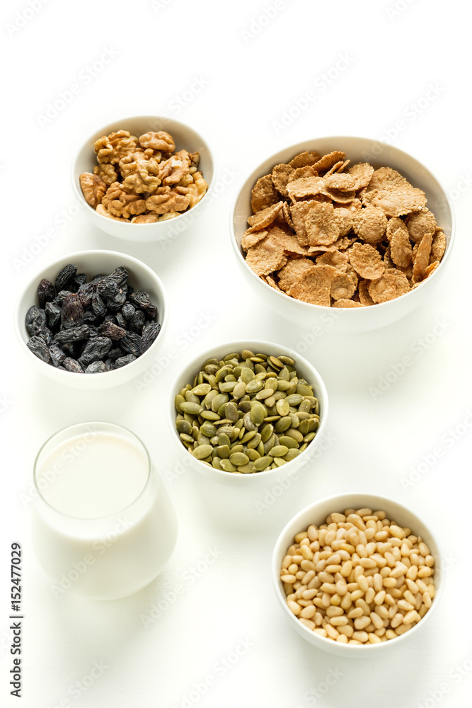 Healthy food. Milk, multi grain flakes and nuts for breakfast. Healthy food. Milk, multi grain flakes and nuts for breakfast.