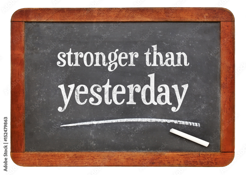 stronger than yesterday text on blackboard stronger than yesterday text on blackboard
