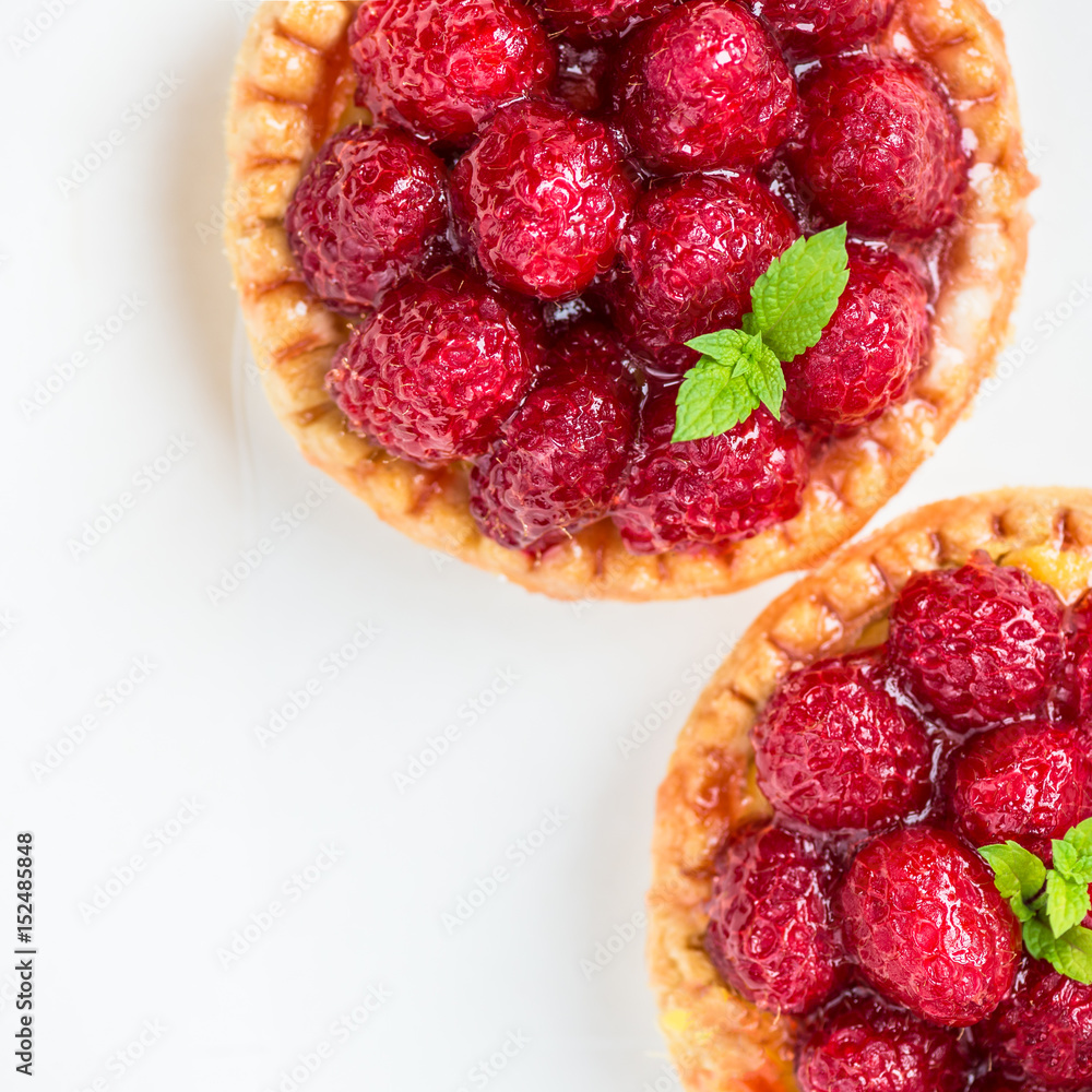 Raspberry Tarts with Mint Leaves Raspberry Tarts with Mint Leaves