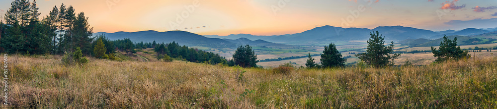 Beautiful sunset in the mountains, north-western Bulgaria, near the Busintsi village and Tran city, panoramic view