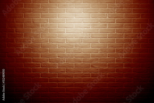 red brick wall with light effect and shadow, abstract background photo