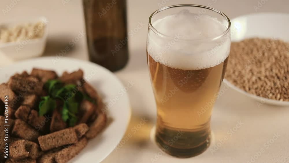 closeup panoramic shot of full glass of amber beer. Still life shot. closeup panoramic shot of full glass of amber beer. Still life shot.