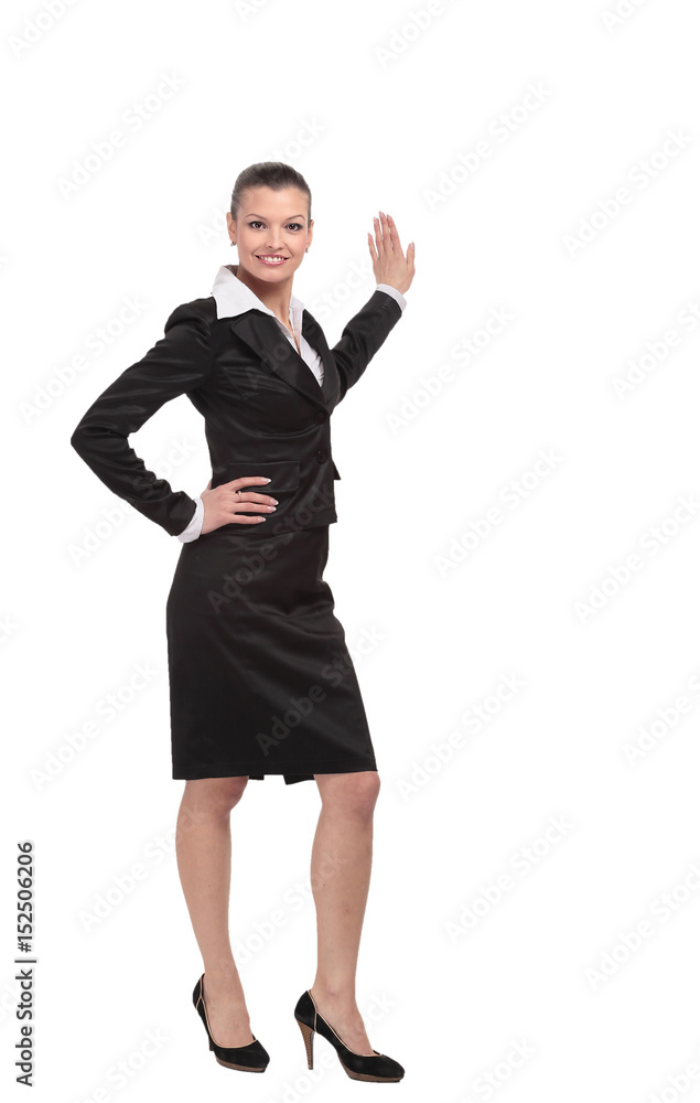 Smiling business woman points to advertise on the wall Smiling business woman points to advertise on the wall