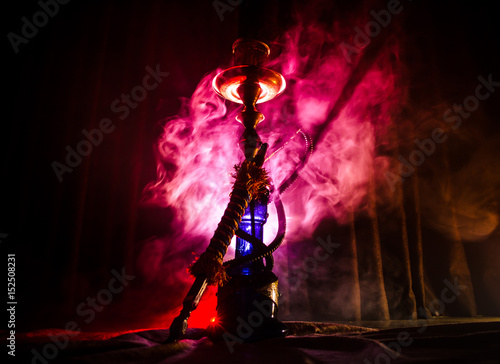 Obraz na plátně Hookah hot coals on shisha bowl with black background