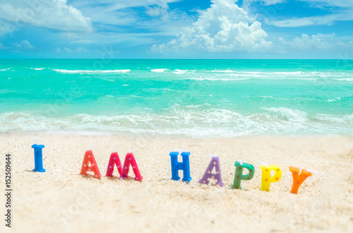 Sign "I am Happy" on the Miami tropical beach