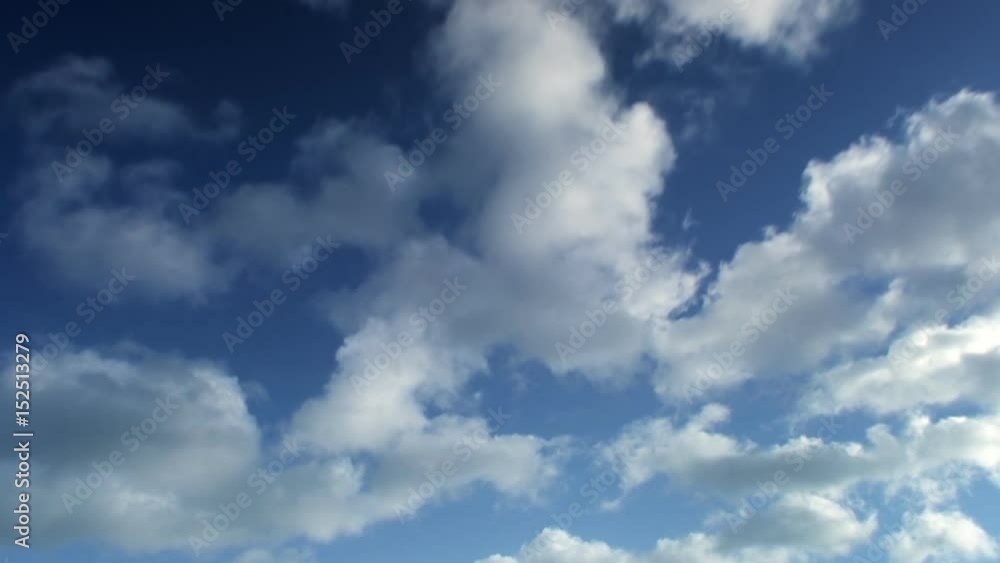 Timelapse of fluffy clouds on blue sky. Timelapse of fluffy clouds on blue sky.
