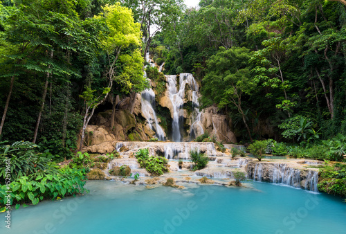 Tad Kwang Si Waterfall Land mark in Luang Prabang, Laos ,beautiful turquoise color water and Tropical forest at Waterfall in north Lao