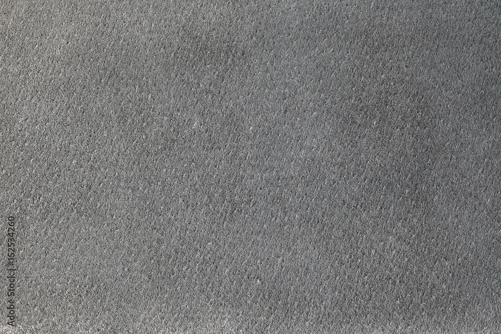 Gray suede texture or background, short fiber, closeup