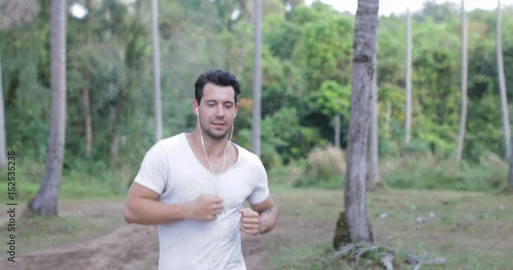 Running Man Runner Guy Training Outdoors Exercising On Forest Path, Young Smiling Male Jogging Alone In Park Slow Motion 60 Running Man Runner Guy Training Outdoors Exercising On Forest Path, Young Smiling Male Jogging Alone In Park Slow Motion 60