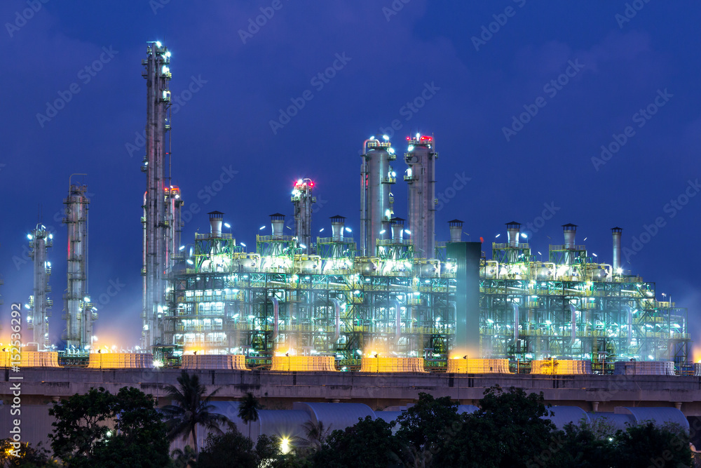 Refinery tower in petrochemical industrial plant with Twilight