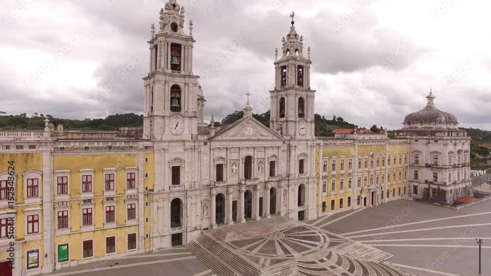 Main facade of the royal palace in Mafra, Portugal, May 10, 2017. Aerial view. Main facade of the royal palace in Mafra, Portugal, May 10, 2017. Aerial view.