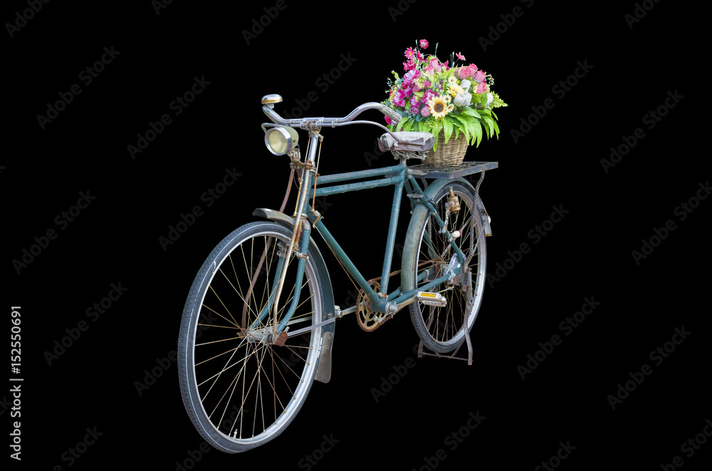 Ancient bicycle Flower basket On a black background