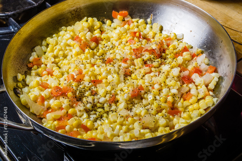 Sweet corn red peppers and onions