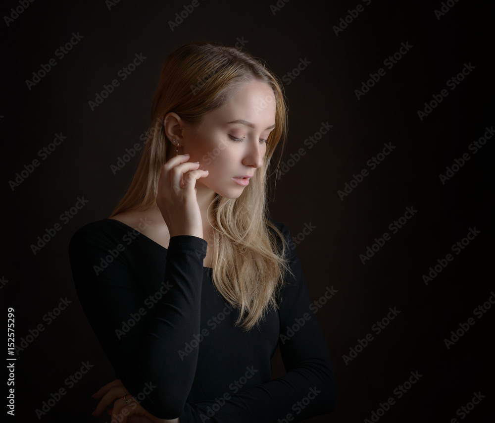 Portrait of a beautiful young woman with blue eyes. Portrait of a beautiful young woman with blue eyes.