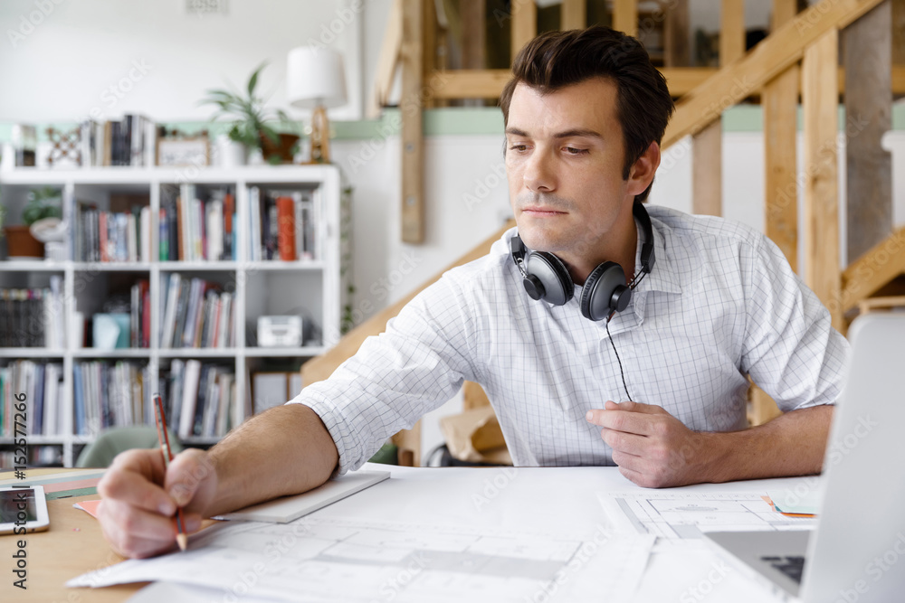 Young businessman in office