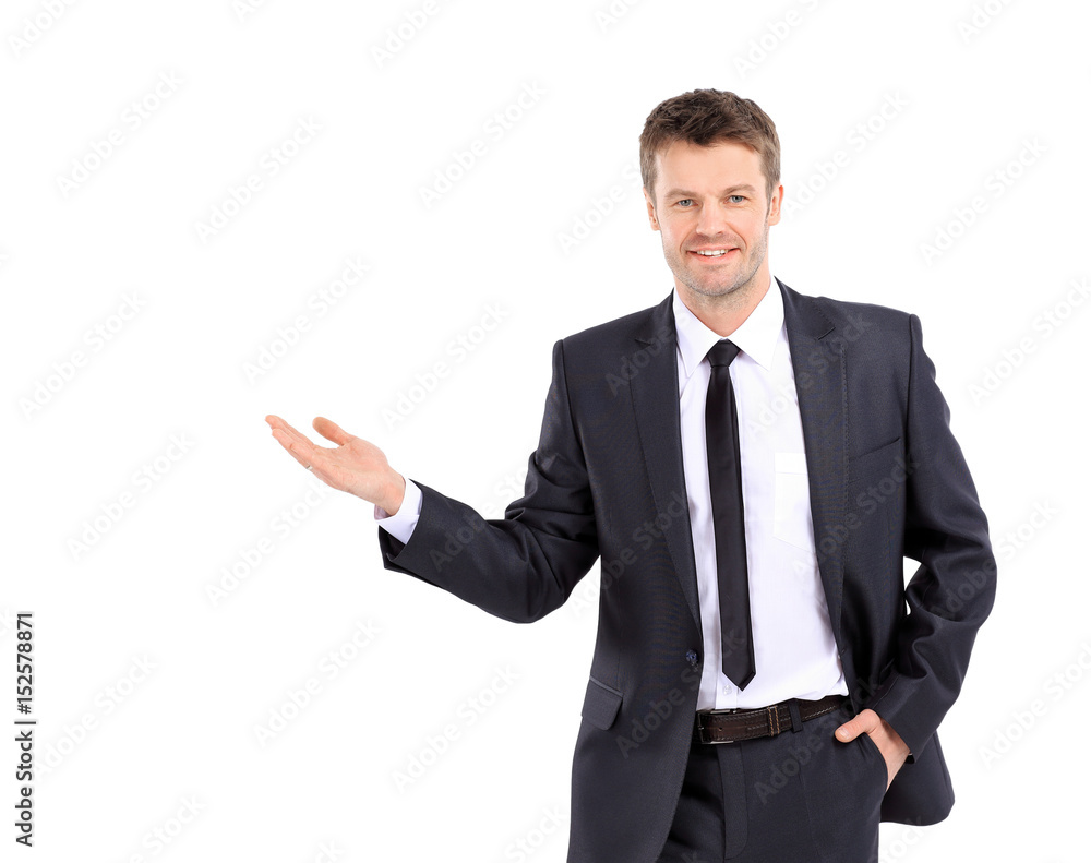 Happy smiling business man showing blank area for sign or copysp Happy smiling business man showing blank area for sign or copysp