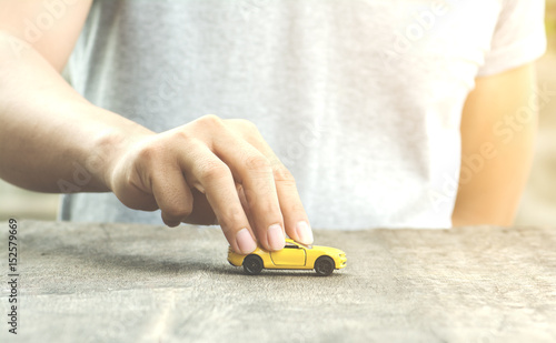 human with toy car vintage light