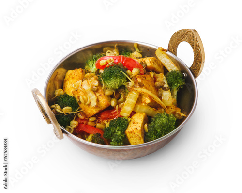Canvas Print Vegan and vegetarian indian restaurant dish, tofu stir fry isolated