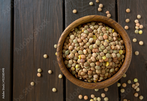 lentils on wooden surface photo