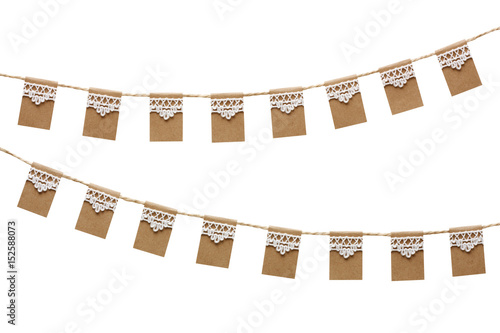 Bunting party flags made from kraft paper and lace isolated on white background