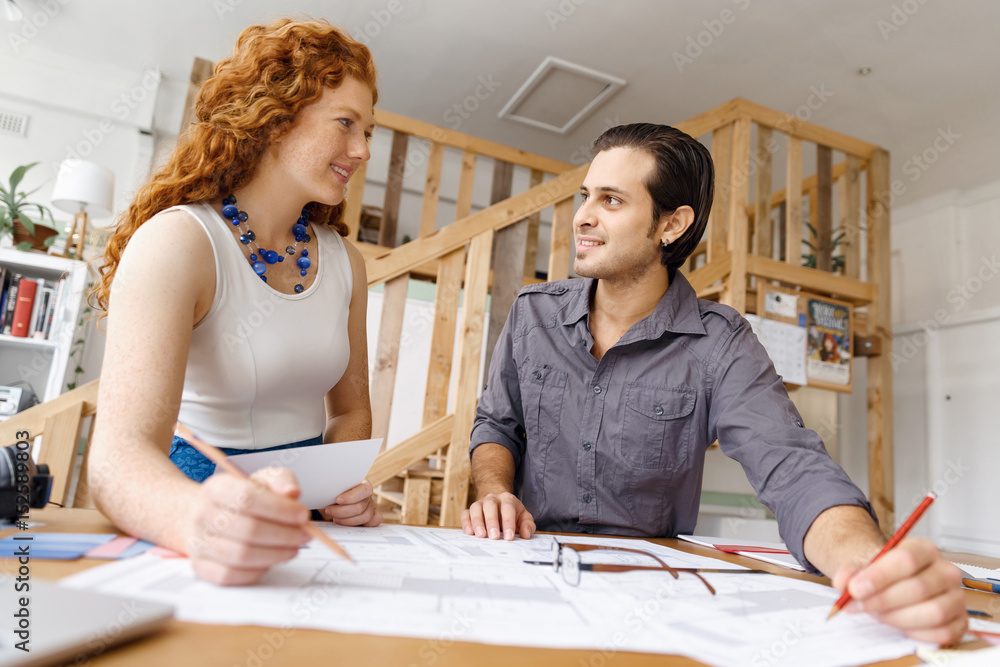 Two young architects in office Two young architects in office
