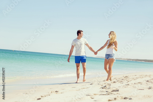 Romantic young couple on the beach © Sergey Nivens
