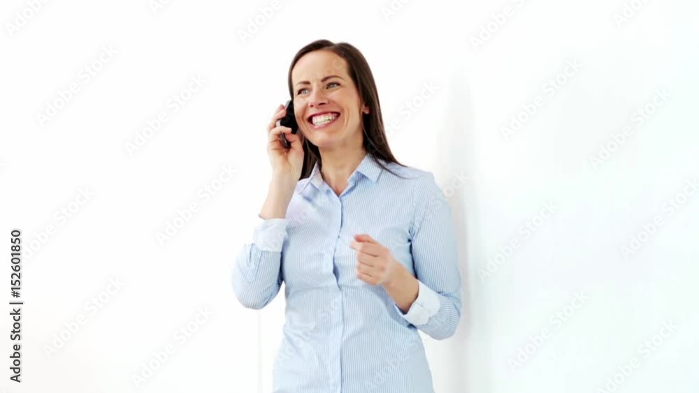 businesswoman calling on smartphone at office businesswoman calling on smartphone at office