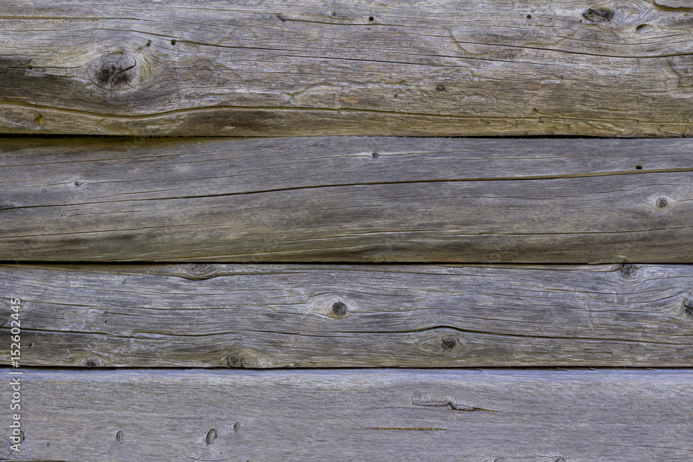 Obraz premium Wooden wall made from logs. Background texture