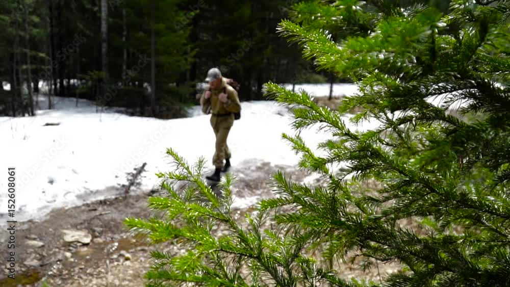 Young people walk in the woods, trekking, hiking, travelers Young people walk in the woods, trekking, hiking, travelers