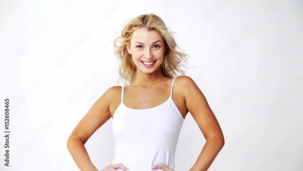 happy smiling beautiful young woman in white top happy smiling beautiful young woman in white top
